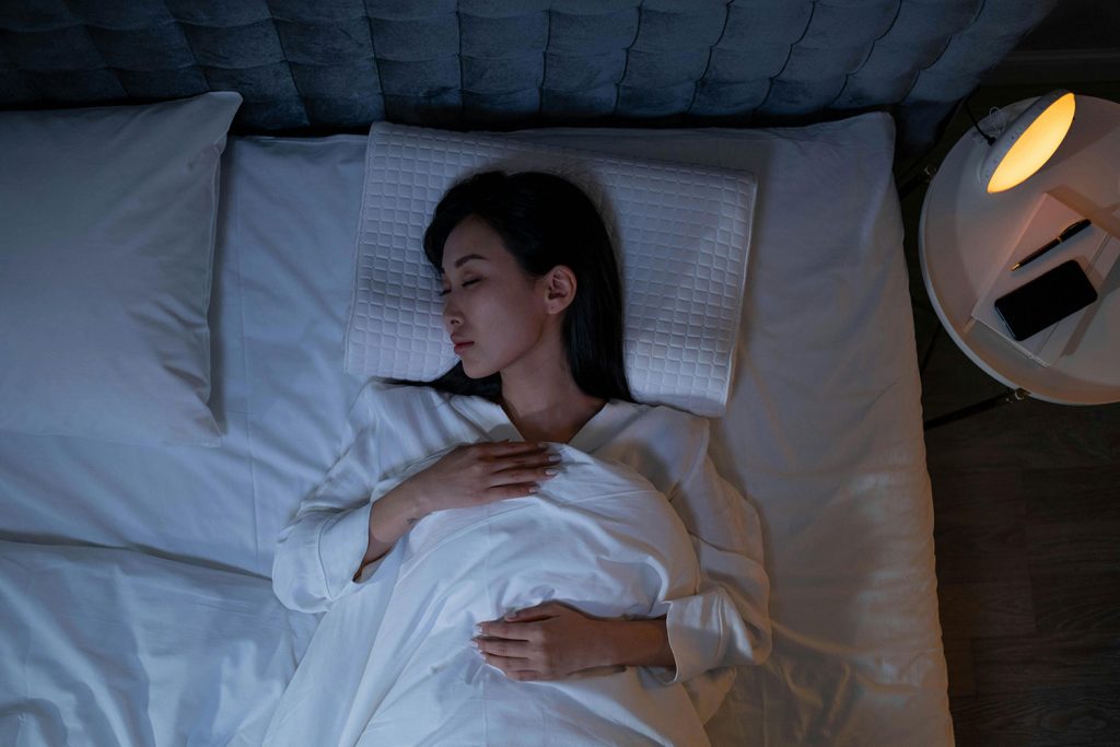 woman sleeping in bed